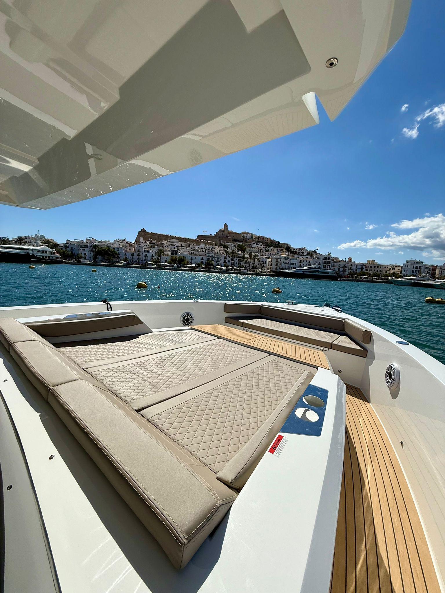 Outdoor lounge area with Mediterranean views on De Antonio 50 Coupé