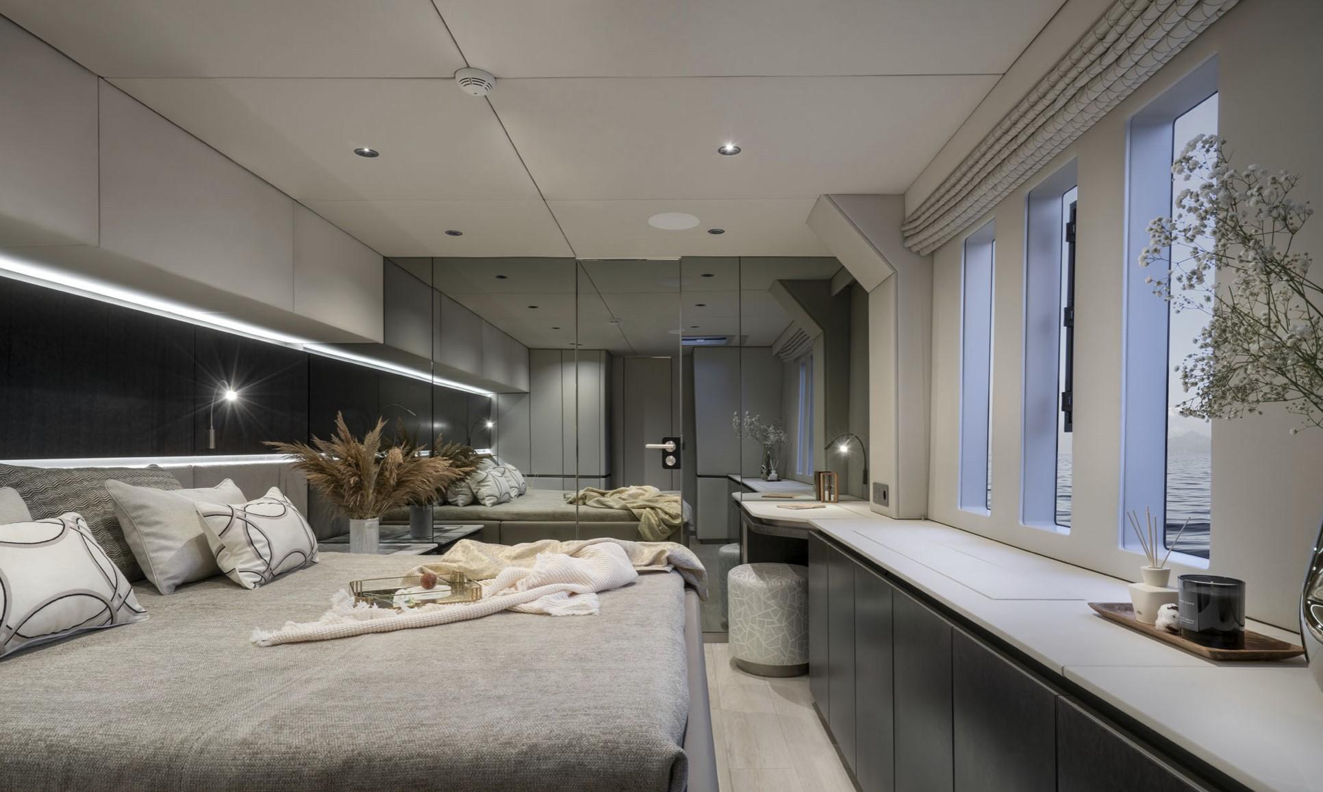 Spacious master cabin with panoramic windows aboard Sunreef 70+
