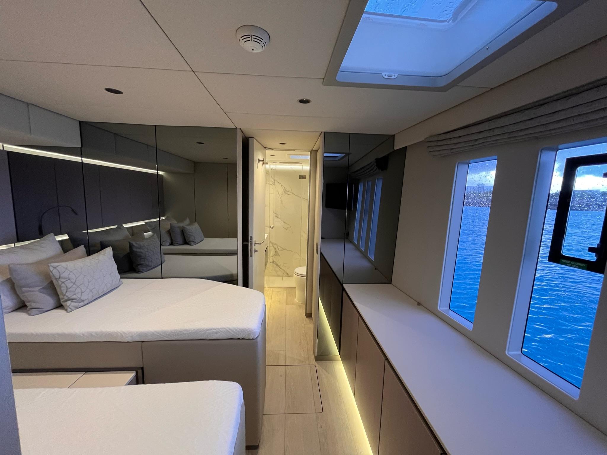 Twin guest cabin aboard Sunreef 70+ luxury catamaran