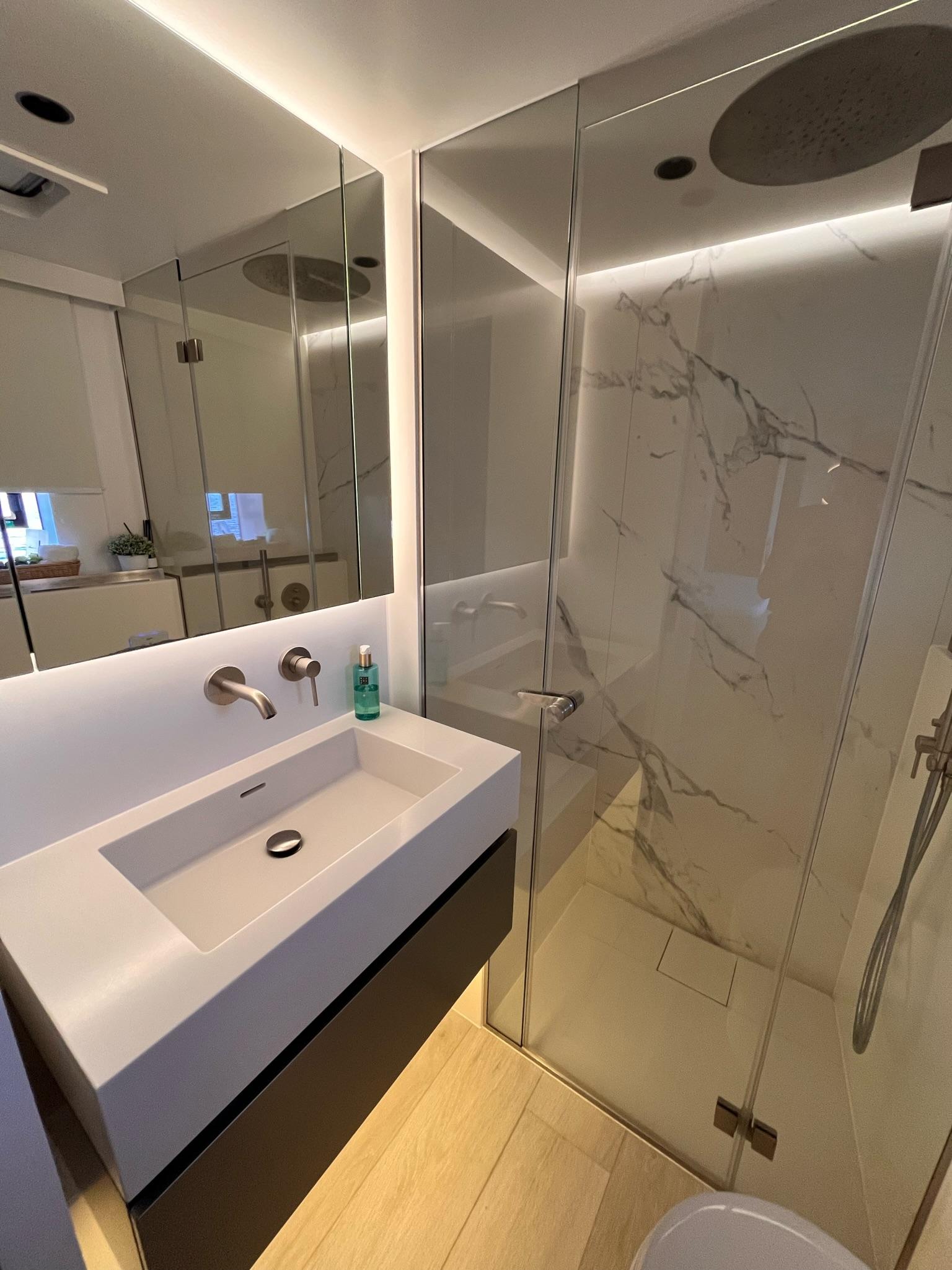Premium ensuite bathroom with elegant finishes inside Sunreef 70+