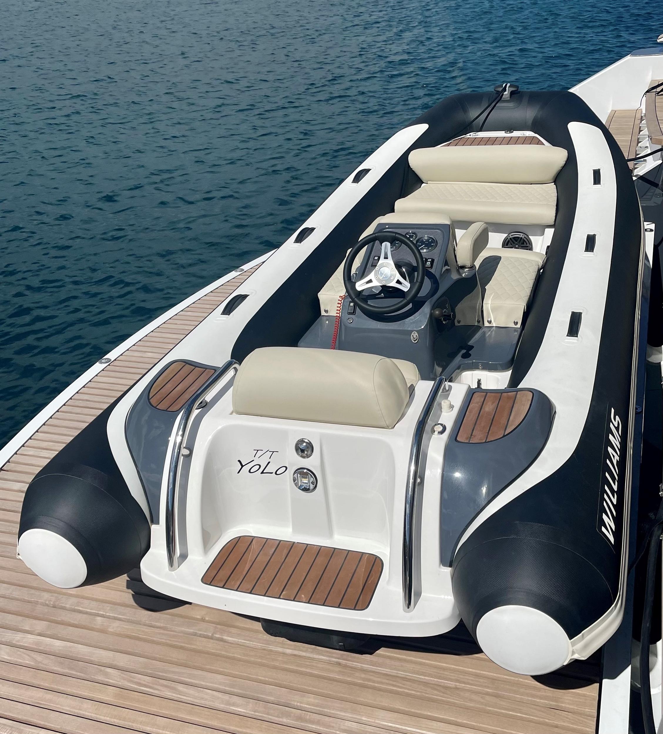 Luxury tender boat accompanying Sunreef 70+ catamaran in Ibiza waters