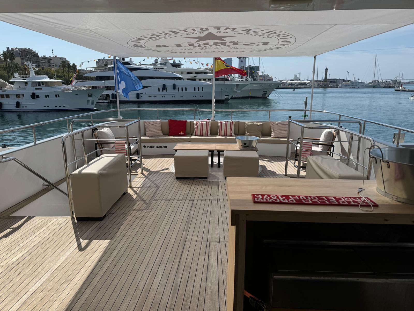 Outdoor flybridge lounge and relaxation area aboard Explorer 92