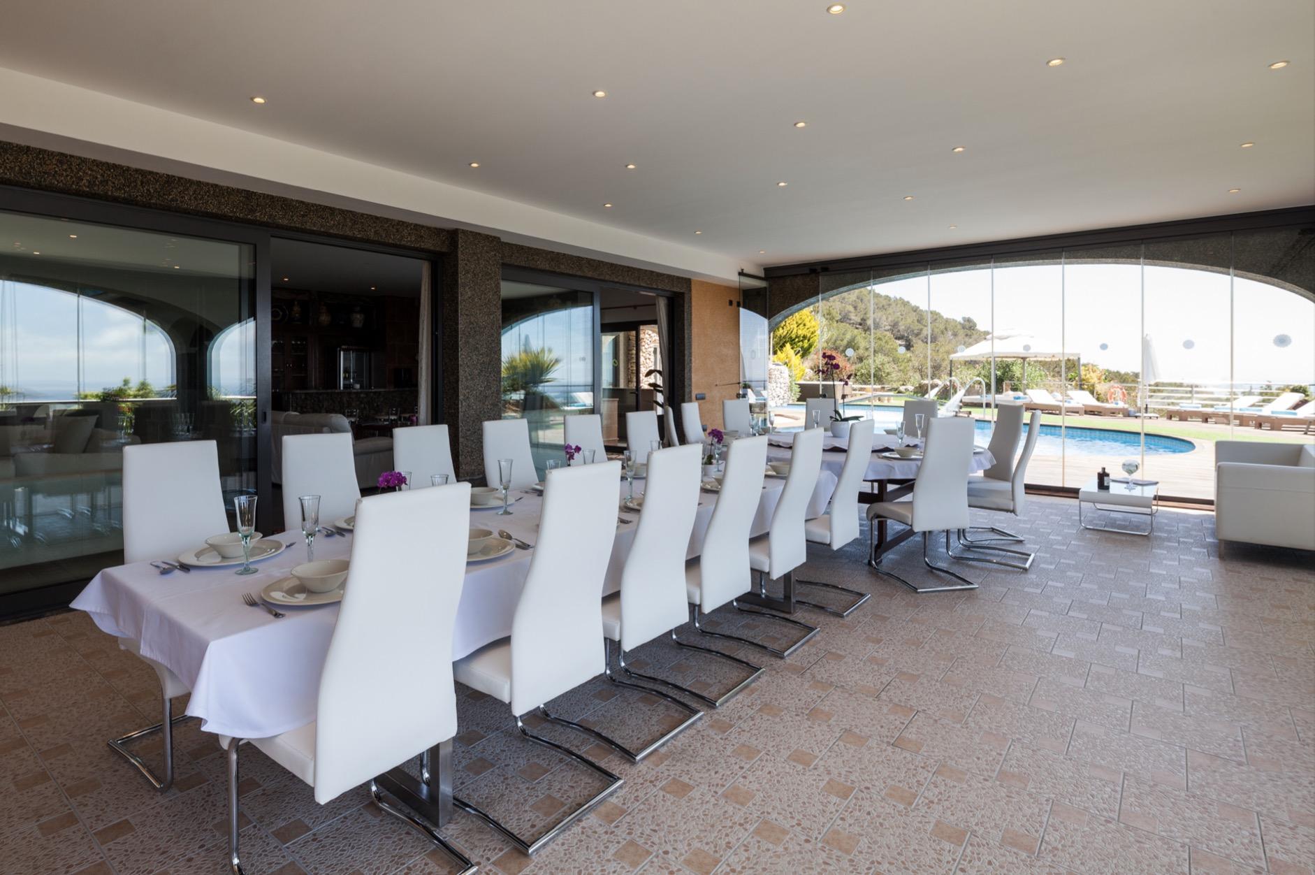 Contemporary outdoor dining area with panoramic sea views in Ibiza