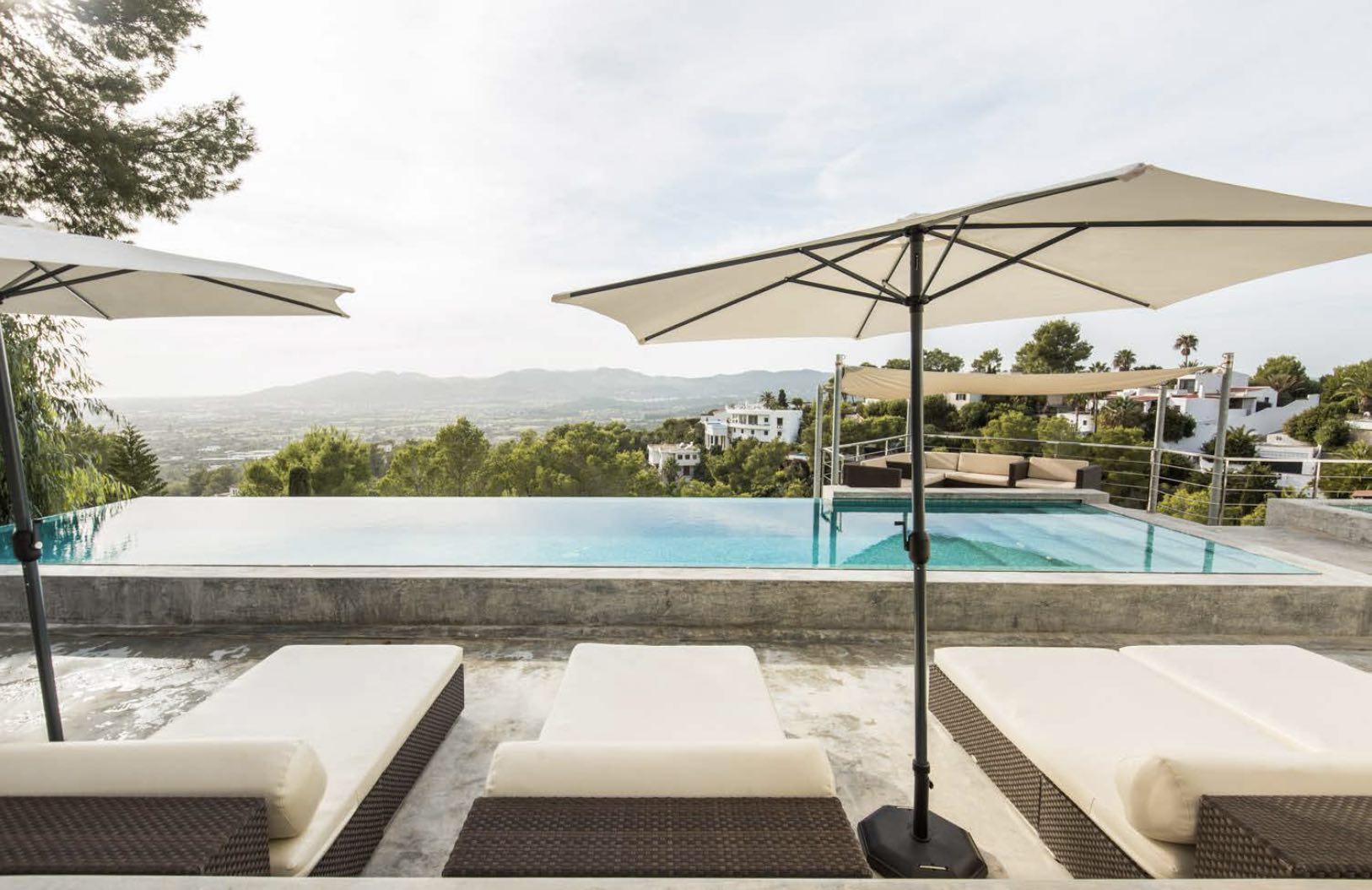 Infinity pool overlooking the Ibiza hills at Villa Oradea
