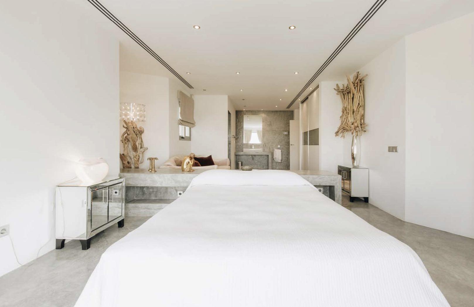 Bright luxury bedroom with modern Mediterranean design at Villa Oradea