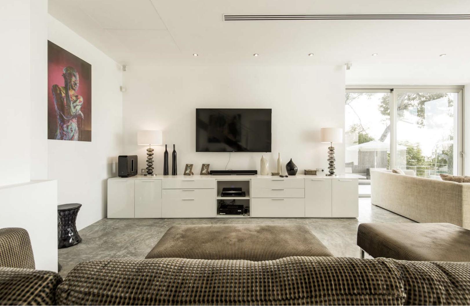 Luxury living room with modern fireplace at Villa Oradea