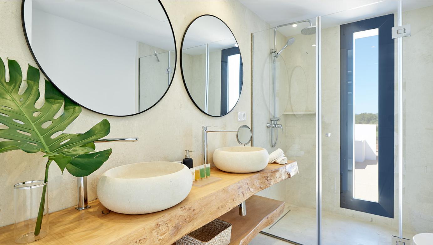 Elegant luxury bathroom with natural stone finishes