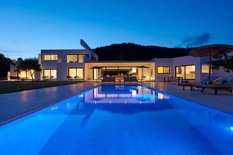 Contemporary luxury villa exterior with private pool