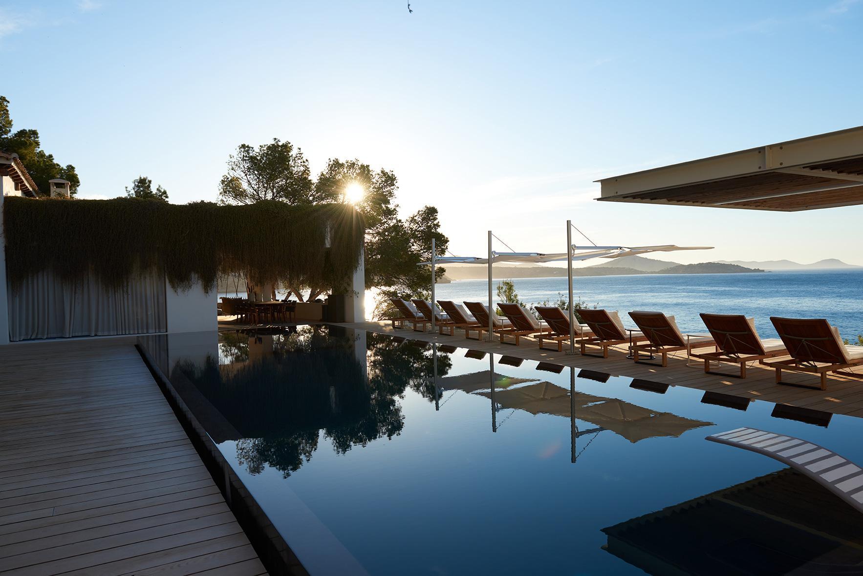 Infinity pool with sunset views at Casa Alegre luxury villa