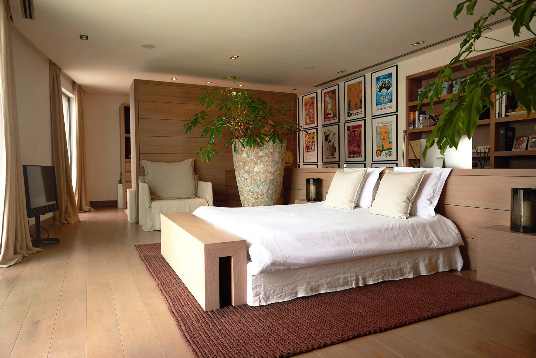 Spacious designer bedroom with natural light at Casa Alegre Ibiza