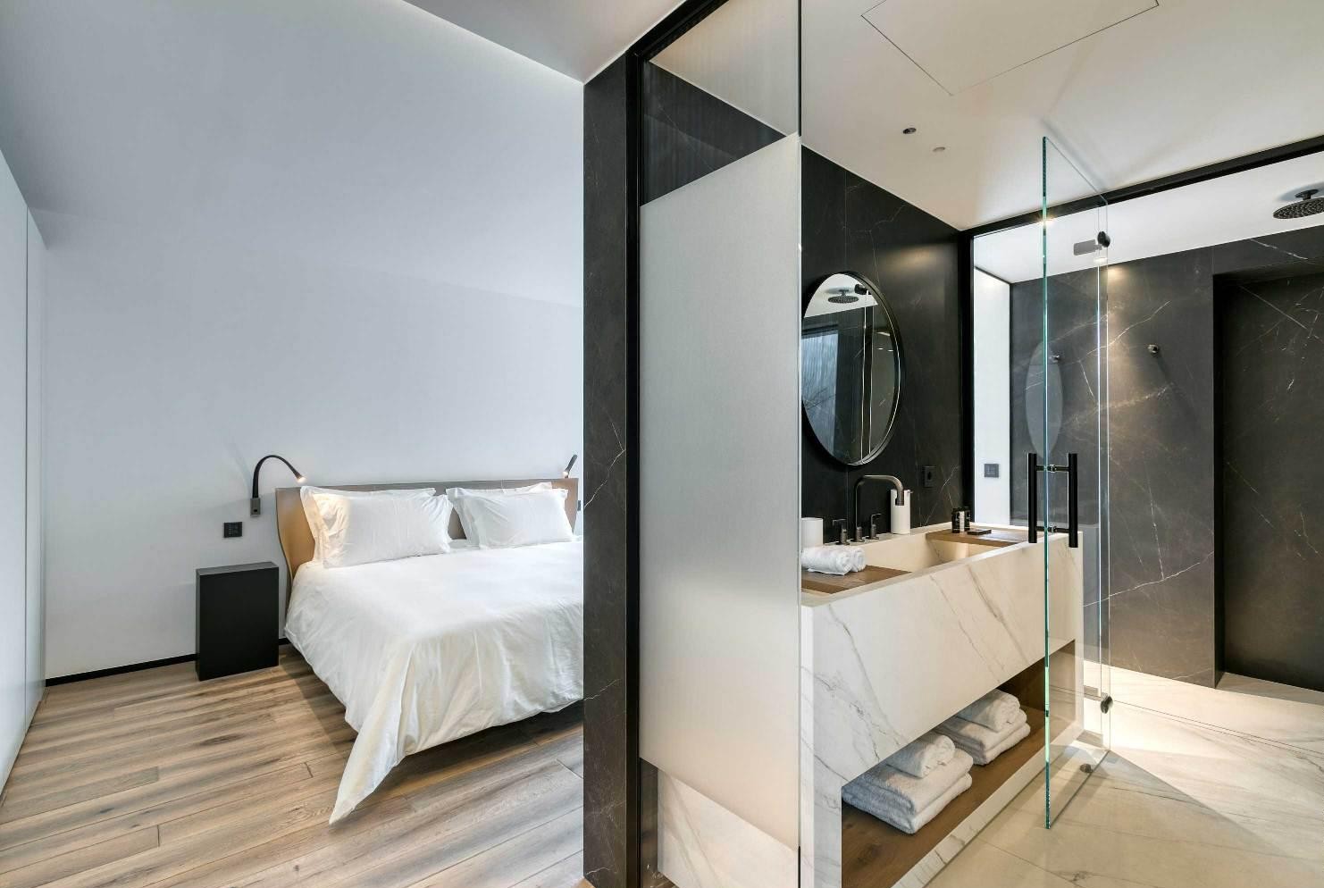 Luxury bathroom with minimalist finishes at Villa Forest Ibiza