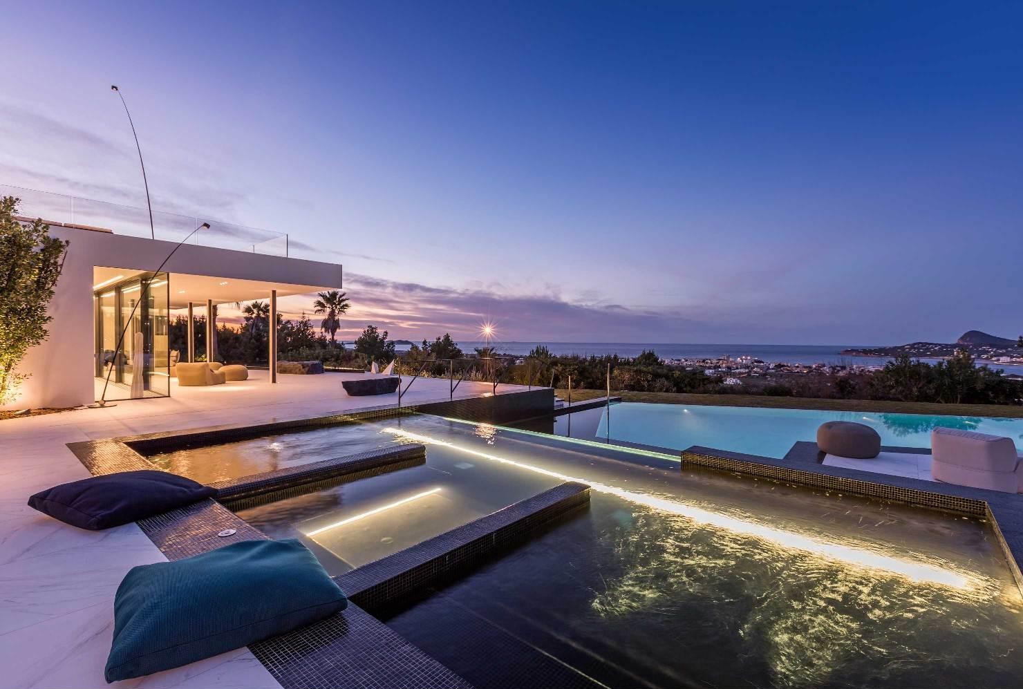 Sunset pool terrace with luxury lounge area at Villa Forest