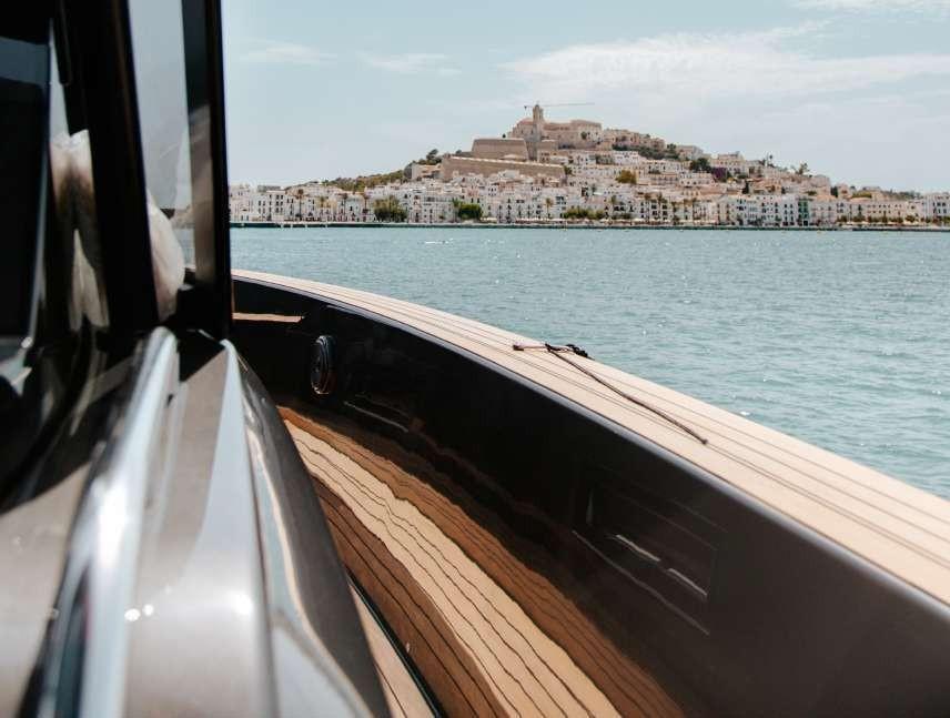 Side deck view with Ibiza coastline from Pardo 50 yacht
