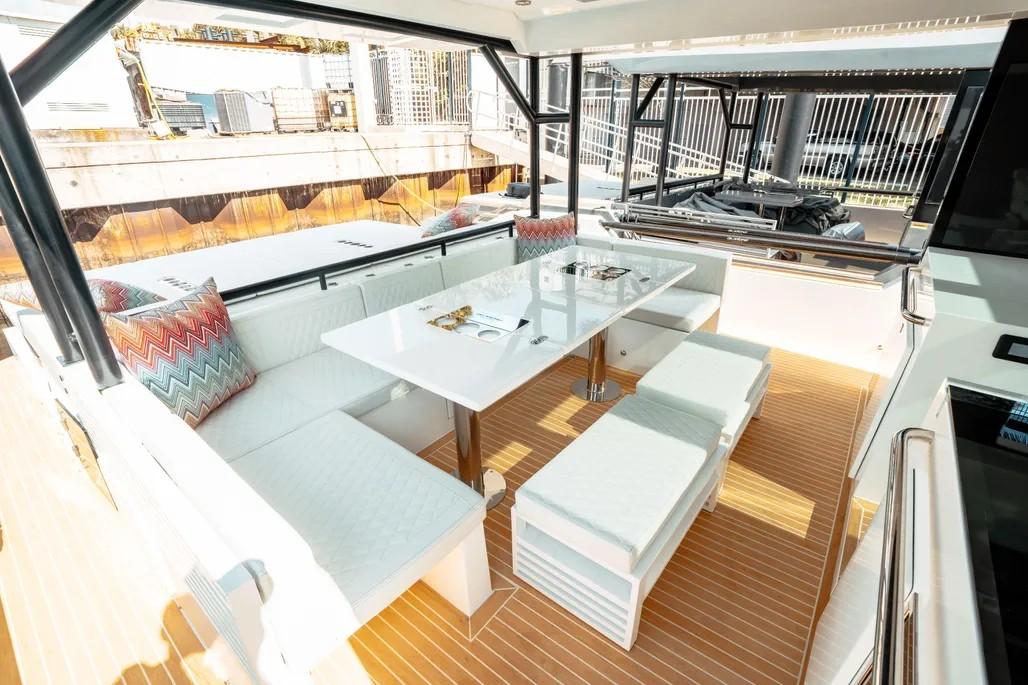 Spacious luxury yacht interior with panoramic sea views aboard De Antonio 50 Coupé