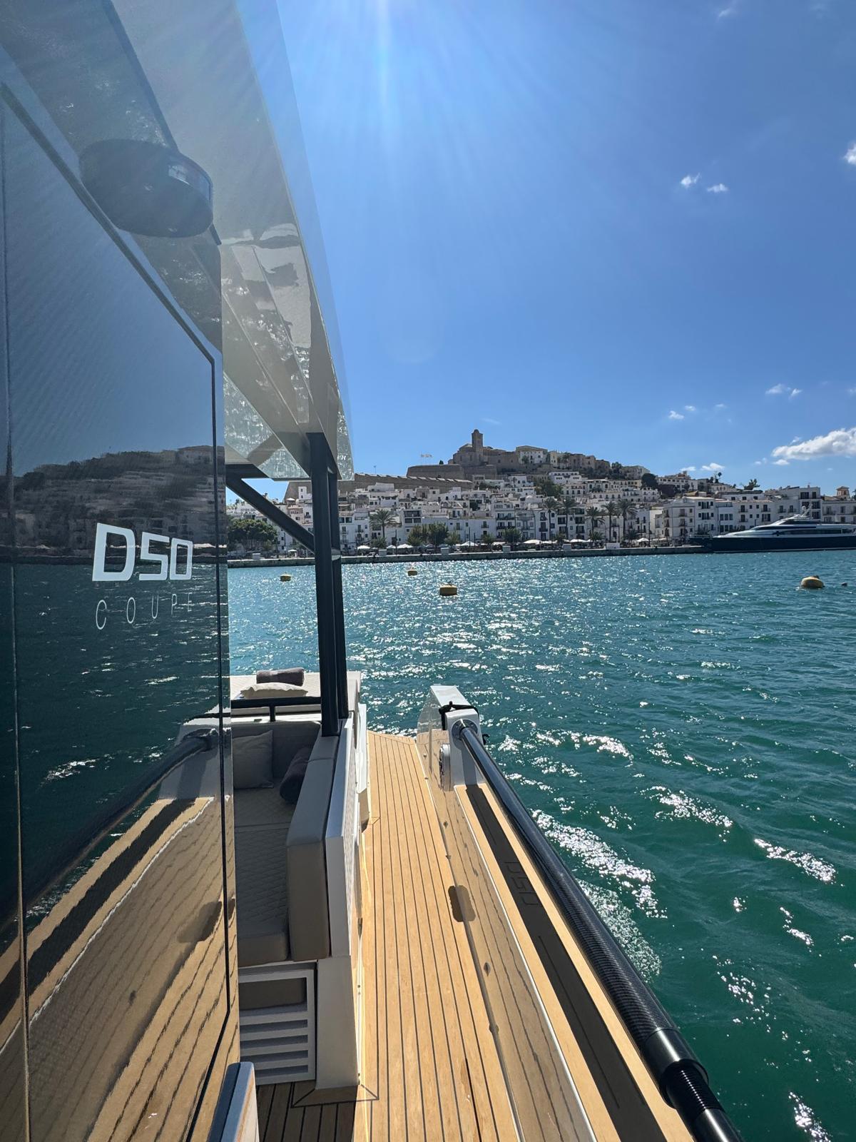 Private yacht experience exploring Ibiza coastline and turquoise sea