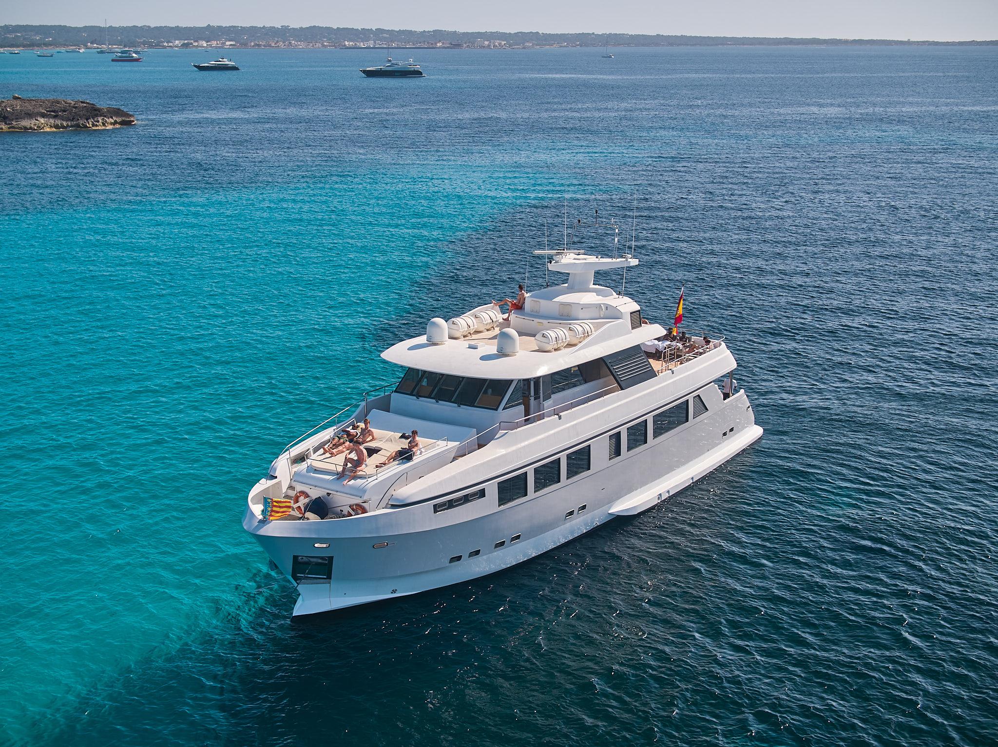 Luxury superyacht sailing in Ibiza turquoise waters