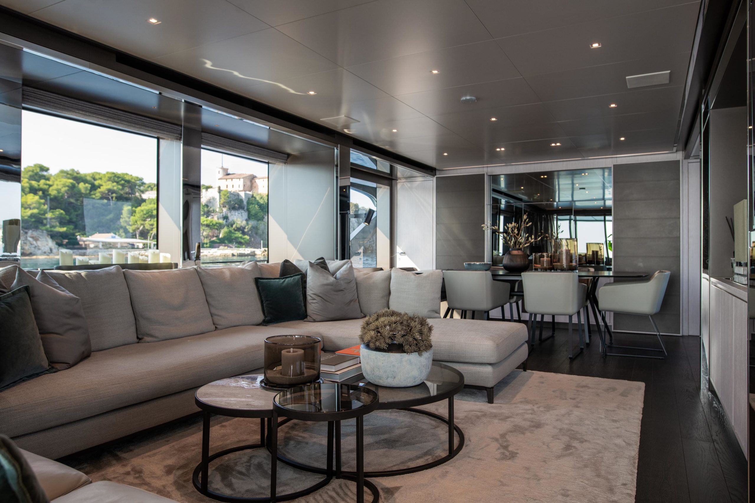 Contemporary salon and dining area inside Riva Argo 90 superyacht