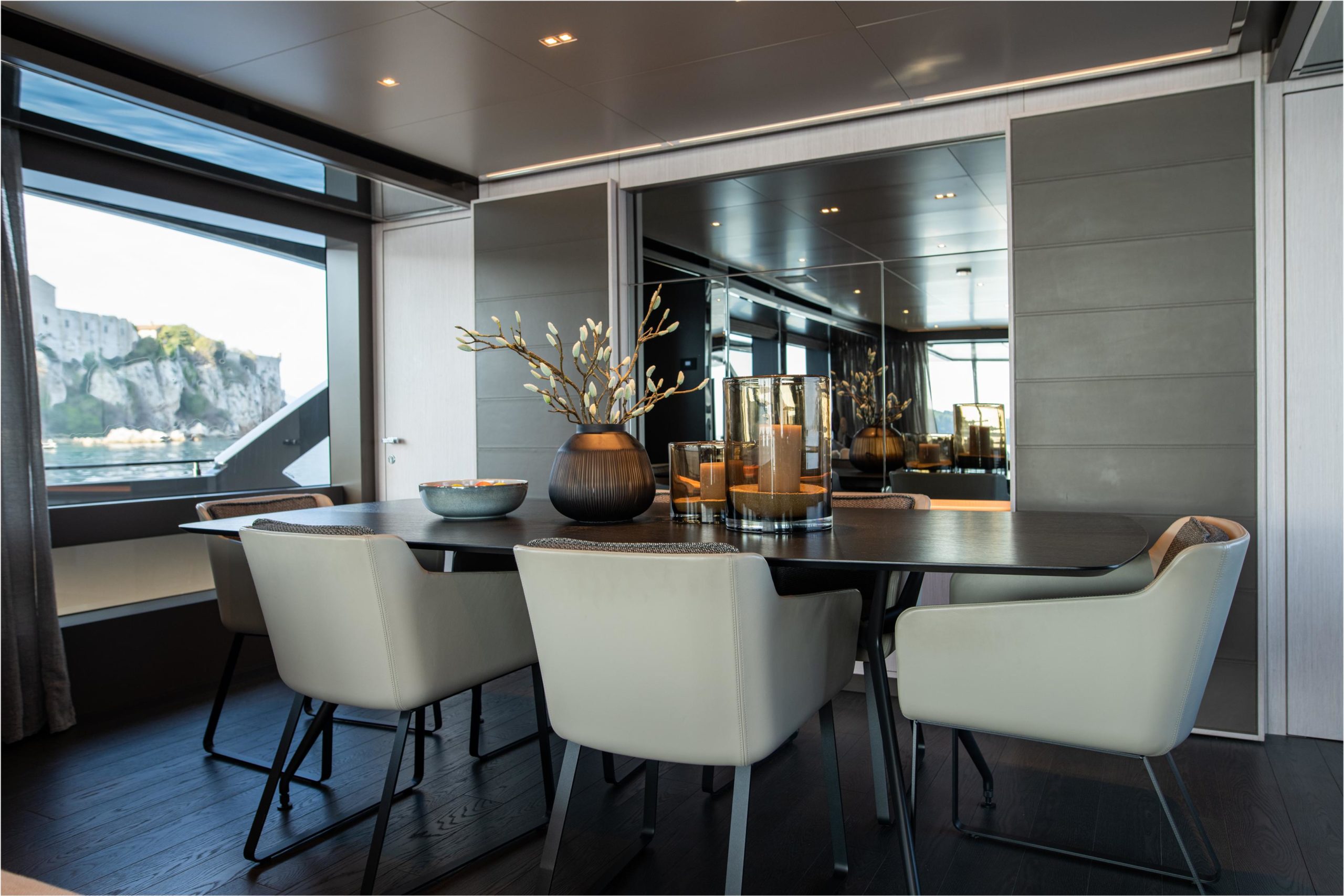 Elegant interior lounge with panoramic sea views aboard Riva Argo 90