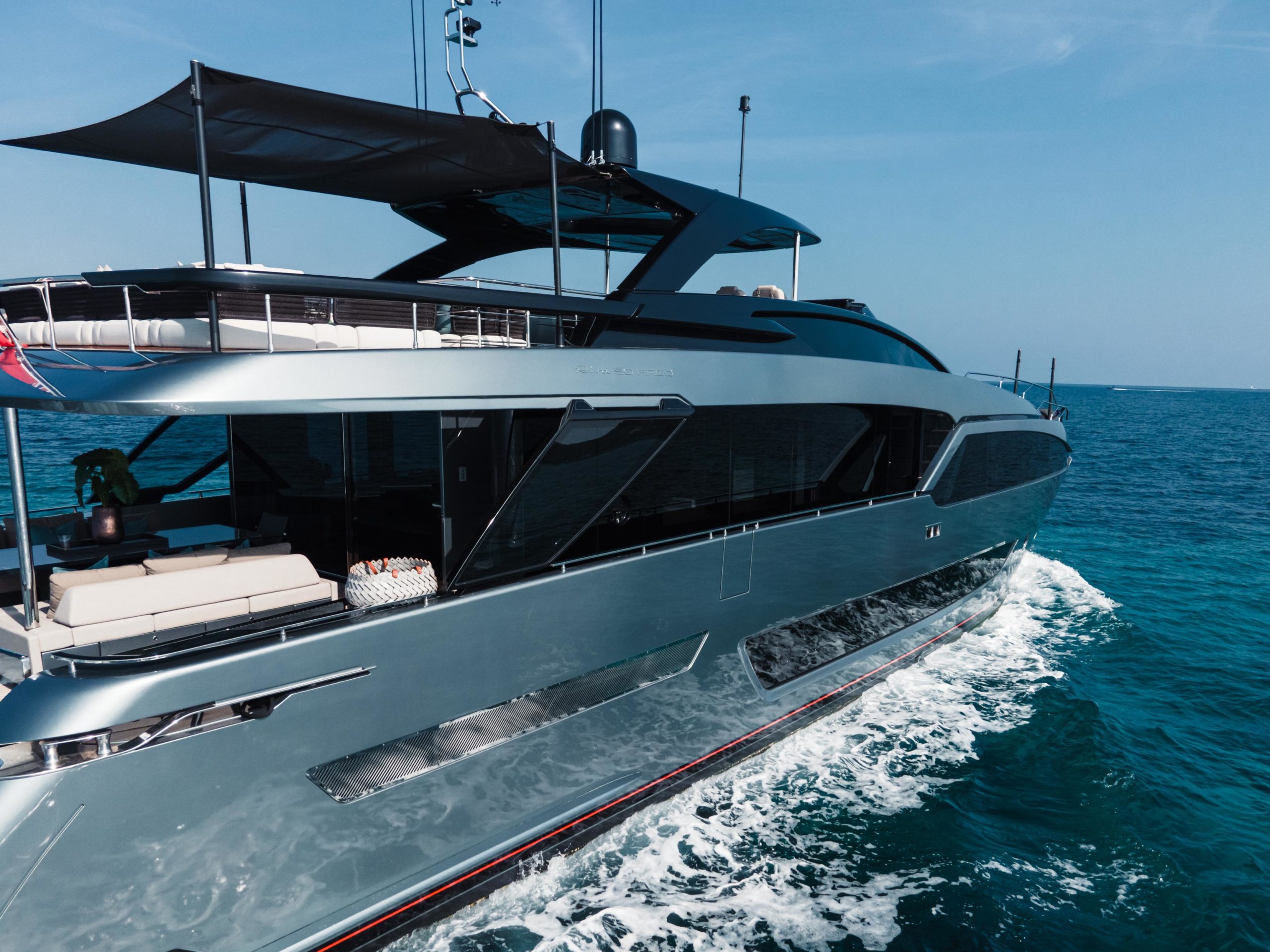 Side exterior profile of Riva Argo 90 cruising through the Mediterranean
