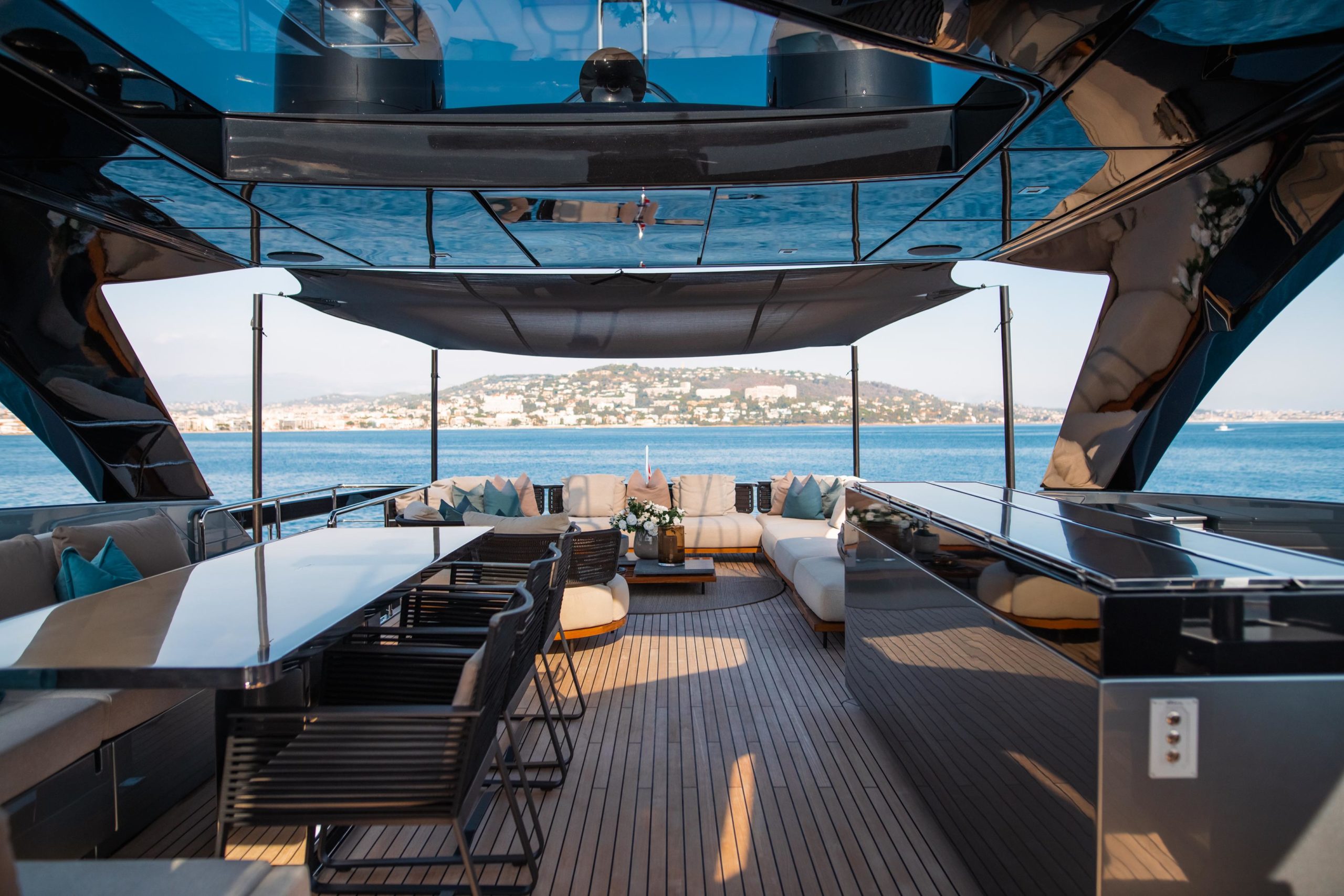 Outdoor dining and relaxation deck on Riva Argo 90 yacht
